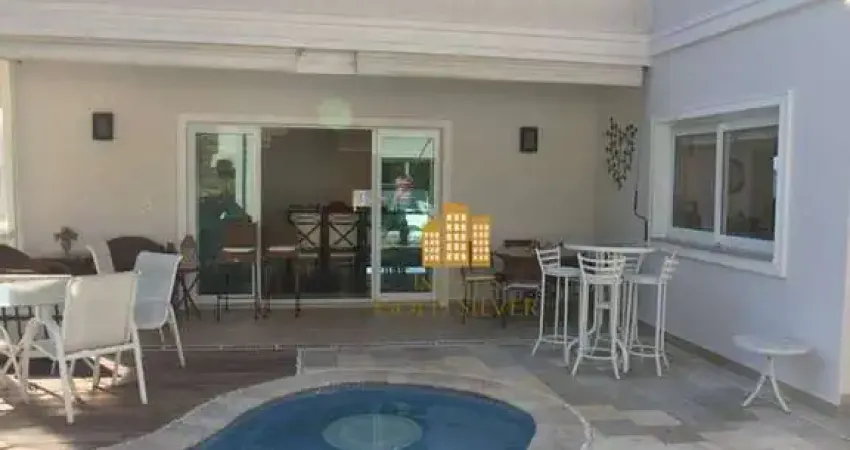 Casa com ar condicionado nas 5 suítes ,7 vagas , espaço gourmet , piscina aquecida , à venda, 460 m² por r$ 3.800.000 - alphasítio alphaville /sp