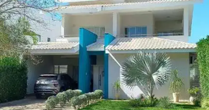 Casa com 4 dormitórios à venda, 319m² por R$ 1.900.000