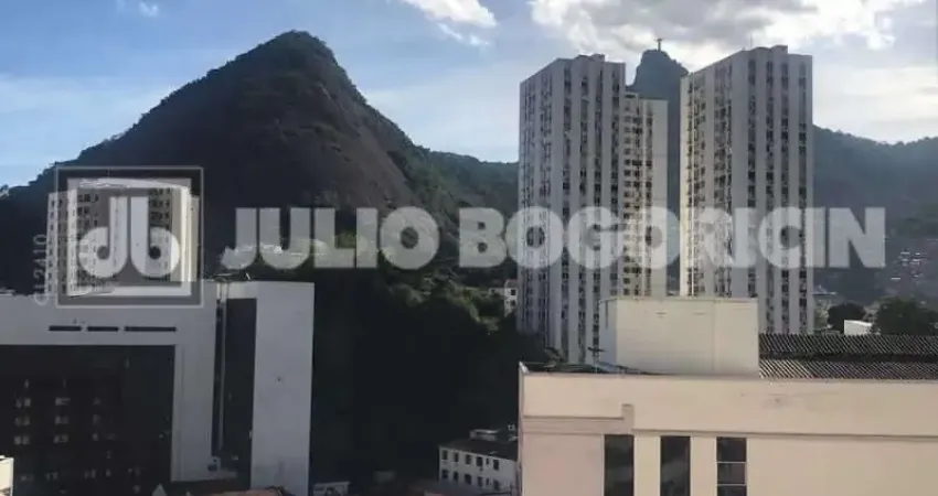 Laranjeiras conjugado dividido sala e quarto reformado fundos silencioso andar alto portaria 24hs