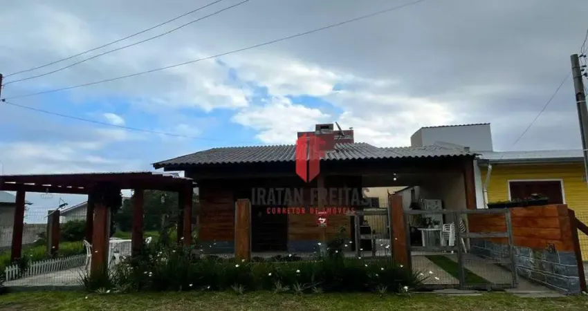 Casa com 6 dormitórios à venda por R$ 540.000,00 - Balneário Tupancy - Arroio do Sal/RS