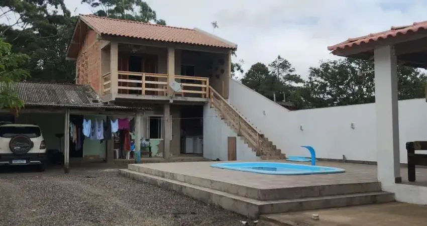 Casa com 4 dormitórios à venda por R$ 310.000,00 - Praia Azul - Arroio do Sal/RS