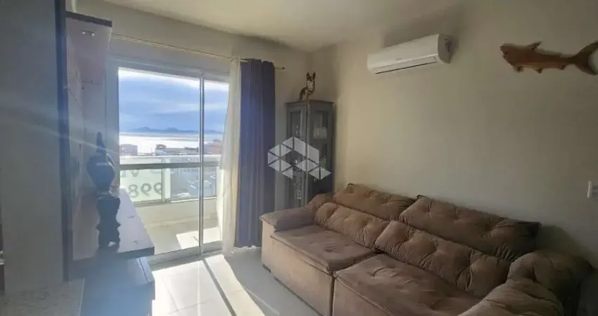 Apartamento no bairro barreiros, em são josé, sc, vista mar, semi-mobiliado, sacada, churrasqueira, 03 quartos sendo 01 suíte, 01 vaga de garagem