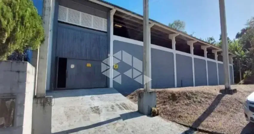 Pavilhão no bairro potecas, em são josé, sc, medindo 1,100m² de área total.