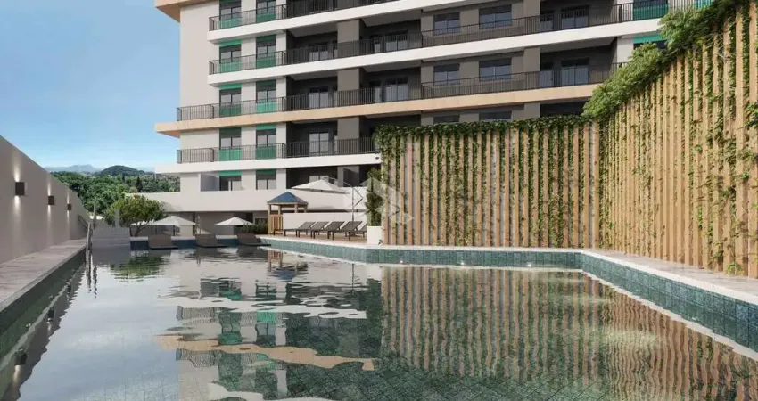 Apartamento tipo studio no bairro roçado, em são josé, sc, com living, cozinha, área de serviço e dormitório integrados, e 01 vaga de garagem.