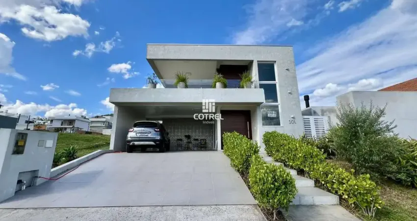 Casa para venda no condomínio fechado Real Park situado no Bairro Tomazetti
