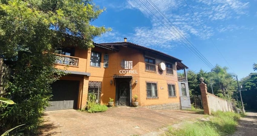 Casa à venda 3 dormitórios sendo 1 suíte, sacada, lareira e 1 vaga de garagem si