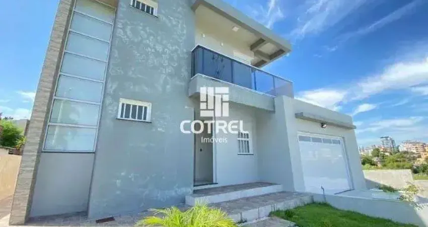 Casa à Venda 3 dormitórios, 1 suíte, lareira, 2 vagas de garagem, situada no bai