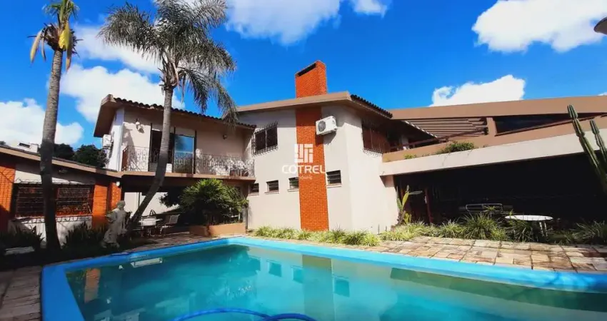 Casa para venda 4 dormitórios sendo 1 suíte, piscina situada no bairro camobi na