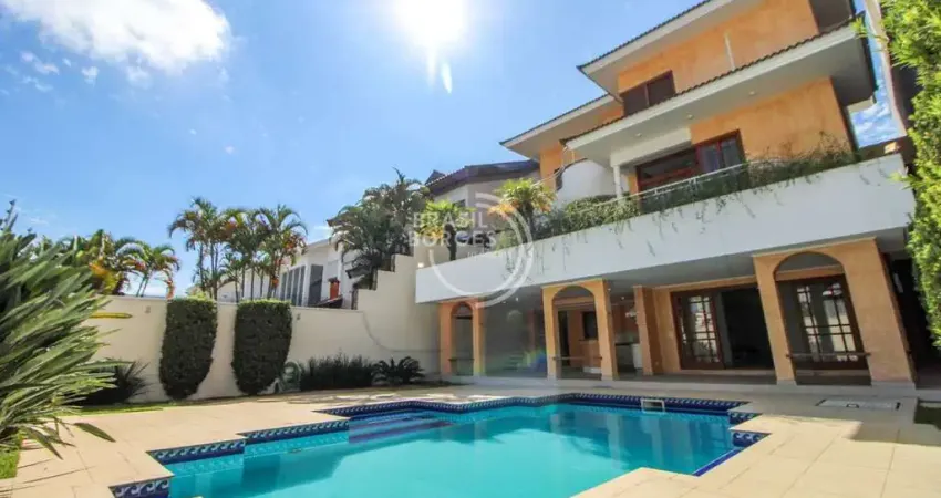 Casa de alto padrão em condomínio isaura 600 m² com piscina, área gourmet e 5 suites