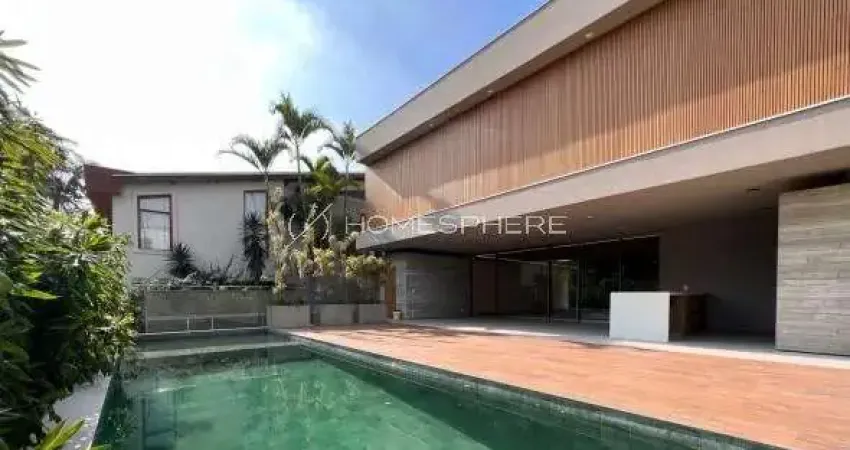 Casa contemporânea à venda no alphaville 1 assinada por rodrigo latorre com 4 suítes e área gourmet