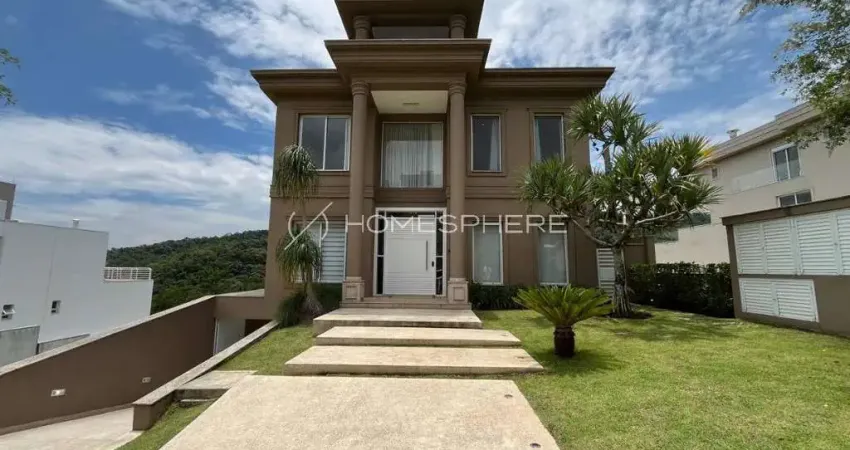 Casa de luxo à venda no gênesis 2 alphaville com 5 suítes, elevador e piscina de borda infinita