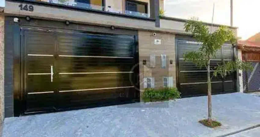 Sobrado com 3 dormitórios à venda, 140 m² por R$ 945.000,00 - Maracanã - Praia Grande/SP