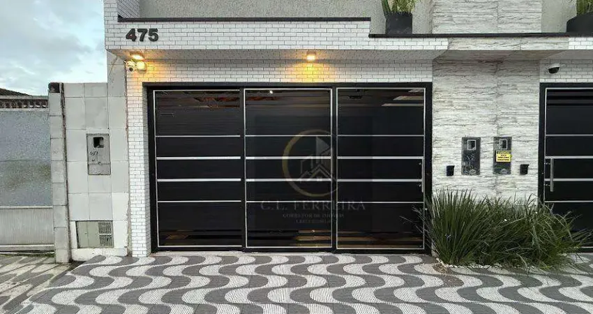 Casa com 3 dormitórios à venda, 103 m² por R$ 900.000,00 - Tupi - Praia Grande/SP