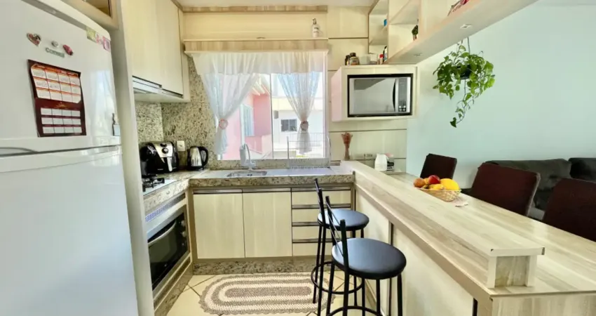 Apartamento com dois dormitórios, sacada com churrasqueira com 68 metros totais em palhoça