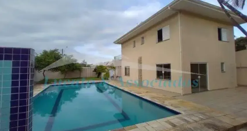 Sobrado no Balneario Florida, Praia Grande SP, sendo 04 dormitorios, 02 suites, 04 vagas, 03 banheiros, piscina, quintal com churrasqueira, fogão de l