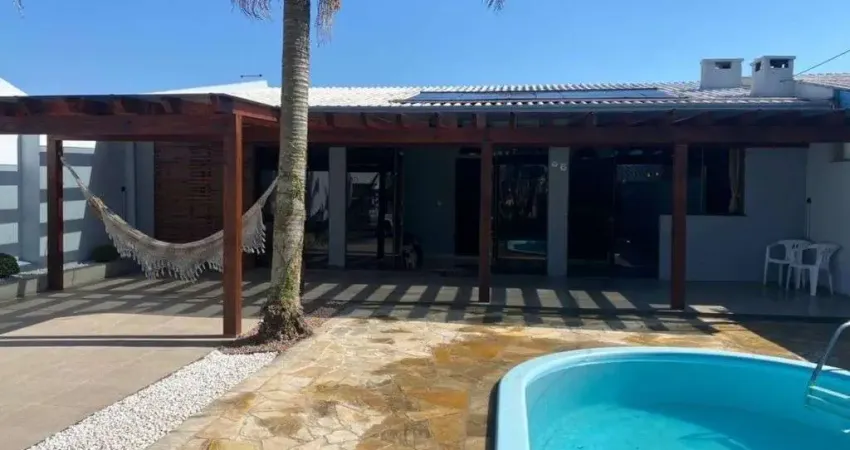 Casa com 4 quartos à venda na rua carlos trindade, e86, Araça, Capão da Canoa