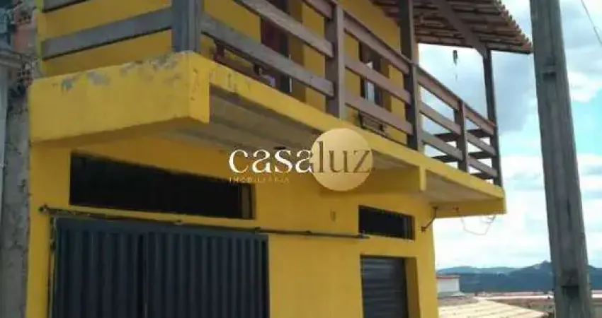 Casa com loja localizada no bairro Serra azul/Sarzedo