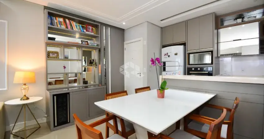 APARTAMENTO COM 2 QUARTOS SENDO 1 SUÍTE SEMIMOBILIADO SACADA COM CHURRASQUEIRA E VISTA PARCIAL DO MAR EM BARREIROS SÃO JOSÉ