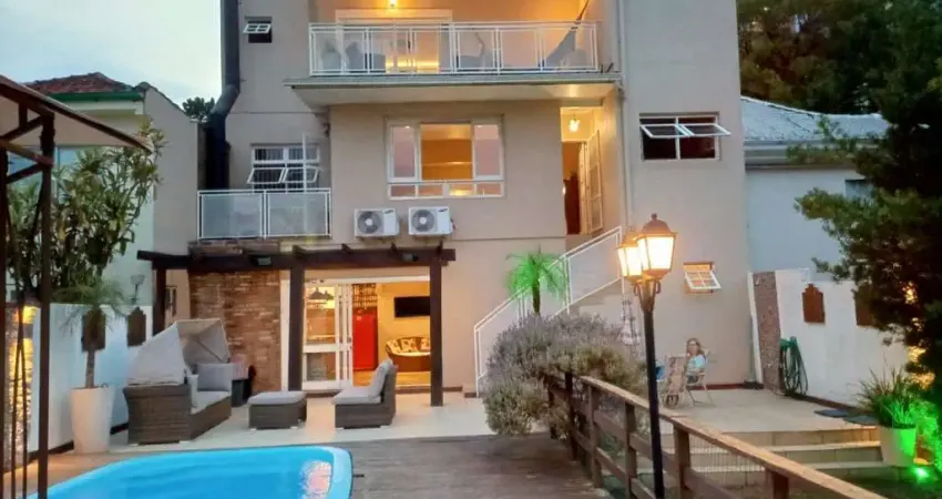 Casa em condomínio fechado com 3 quartos para alugar na Rua Luzitana, 1098, Higienópolis, Porto Alegre