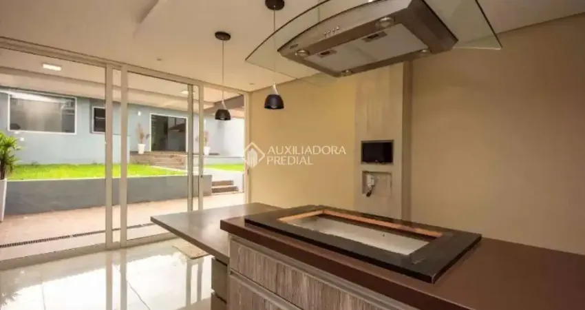 Casa em condomínio fechado com 4 quartos para alugar na Rua Engenheiro Walter Boehl, 448, Vila Ipiranga, Porto Alegre