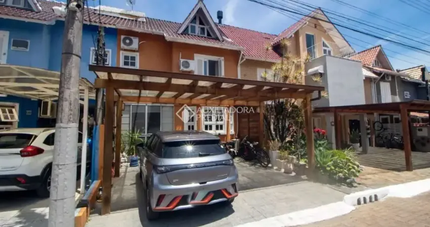 Casa em condomínio fechado com 3 quartos para alugar na Rua Osório Mendes Ouriques, 330, Guarujá, Porto Alegre