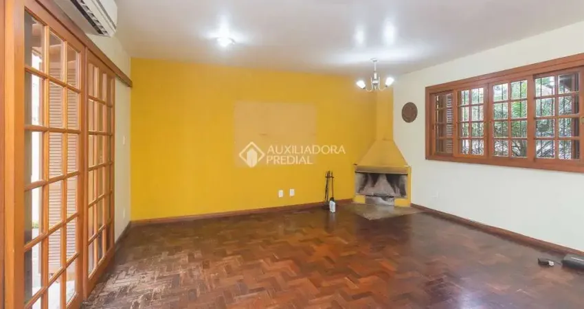 Casa em condomínio fechado com 3 quartos para alugar na Rua Irmão Geraldo, 88, Vila João Pessoa, Porto Alegre