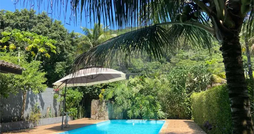 Casa com 4 quartos à venda na Rua Marino Motta, Jardim Guaiuba, Guarujá