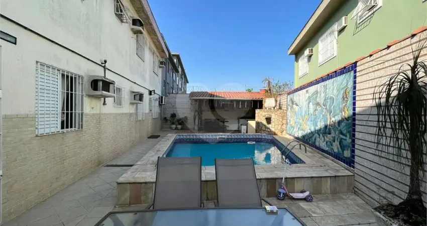 Casa com 4 quartos à venda no Macuco, Santos 