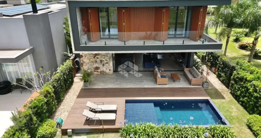 Sobrado à venda, com 4 quartos/dormitórios, 4 vagas/box, no condomínio sea coast, xangri-lá/rs