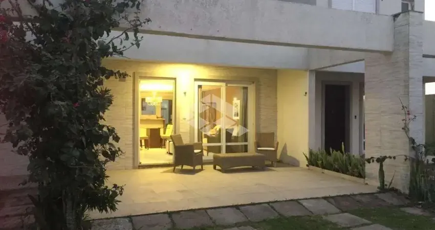 Casa  3 dormitórios 1 suíte no Pateo Marbella em Xangri-lá/RS