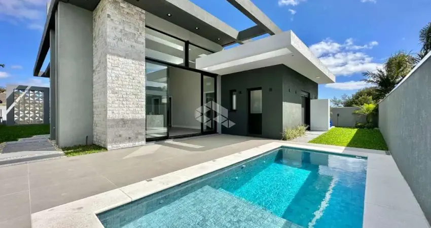Casa à venda com 4 quartos/suítes e 2 vagas/box em Atlântida, Xangri-Lá/RS