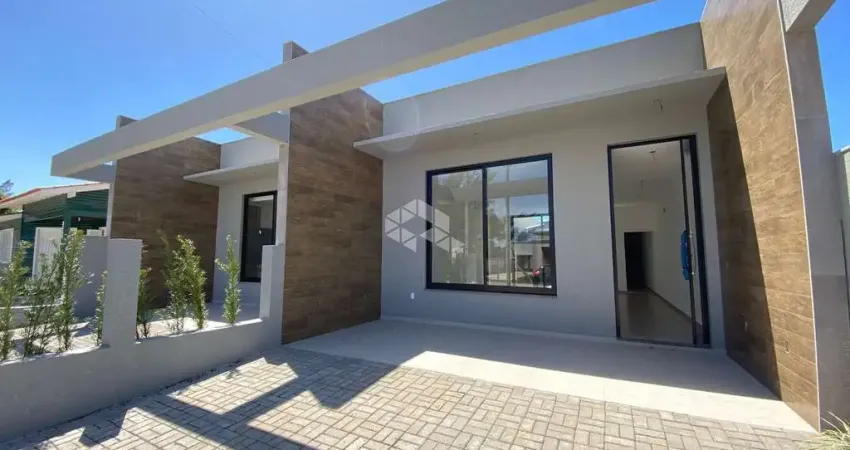 Casa geminada à venda no Centro de Xangri-lá - 3 dormitórios, 110m², pé direito alto