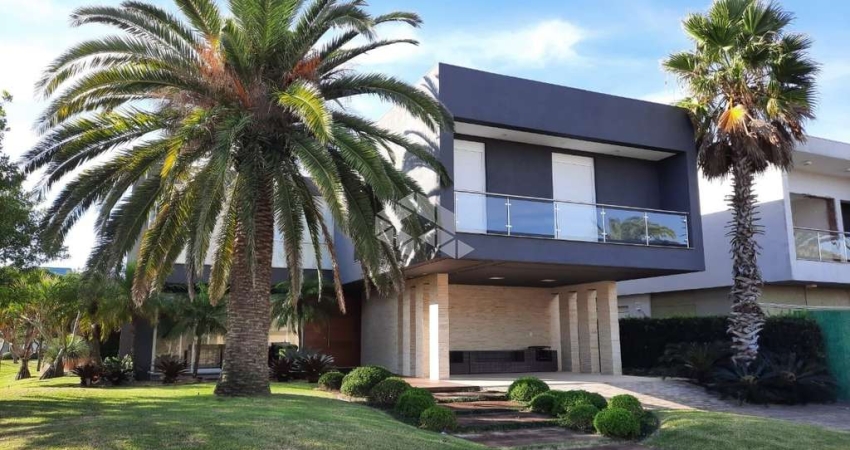 Casa em Condomínio à venda em Xangri-Lá com 6 quartos (6 suítes)