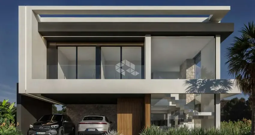 Casa contemporânea com 6 suítes a beira lago