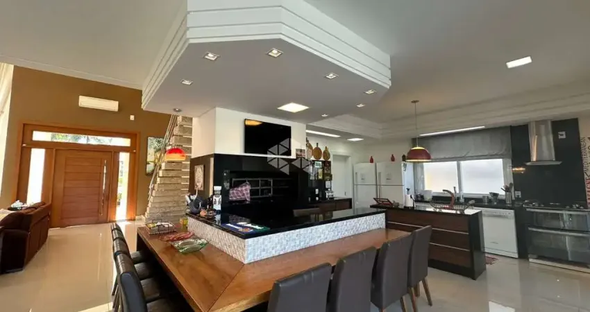 Casa  com 05 suítes, mobiliada e decorada no condomínio enseda.