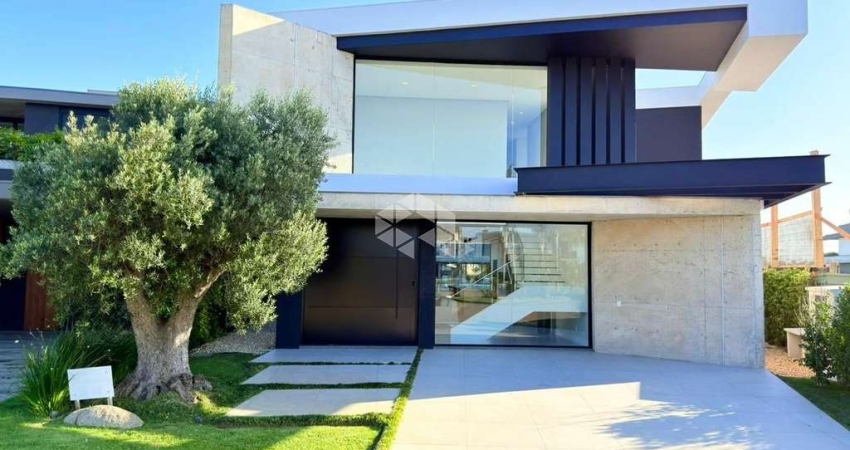 Casa com 05 suítes, mobiliada e decorada no condomínio sense.