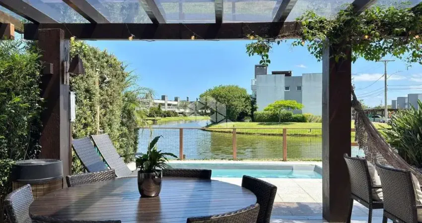 Casa condomínio rossi atlântida 04 dormitórios, 04 suítes 02 vagas, beira lago