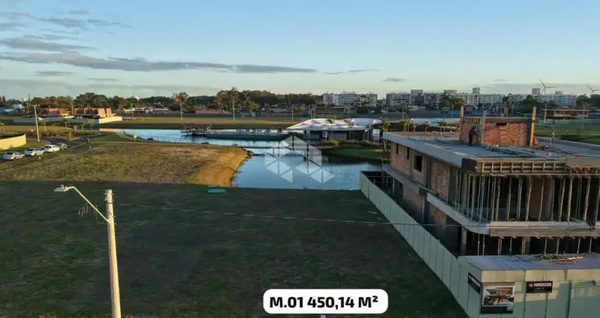 Terreno a beira lago no condomínio Lotus em Atlântida - Xangri-lá