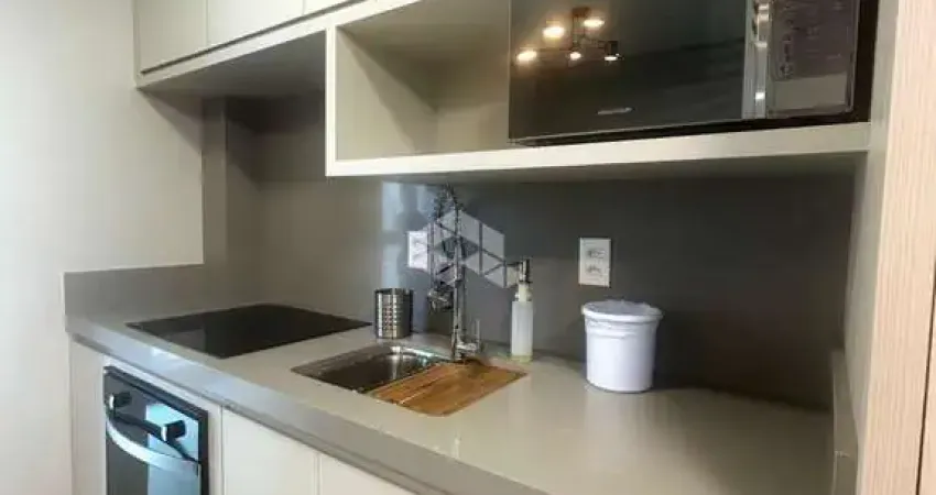 Apartamento com 2 dormitórios sendo 1 suíte e 1 vaga de garagem em itapema