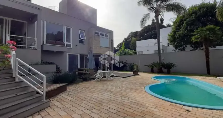 Casa com 4 suítes  e um espaço gourmet, no bairro tamandare, garibaldi