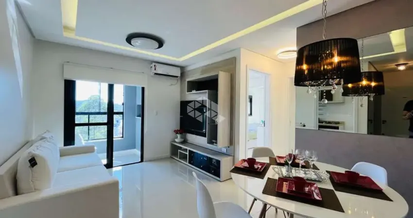 Ótimo apartamento à venda com 02 dormitórios com suíte, sacada com churrasqueira e garagem coberta, no bairro uglione em santa maria.