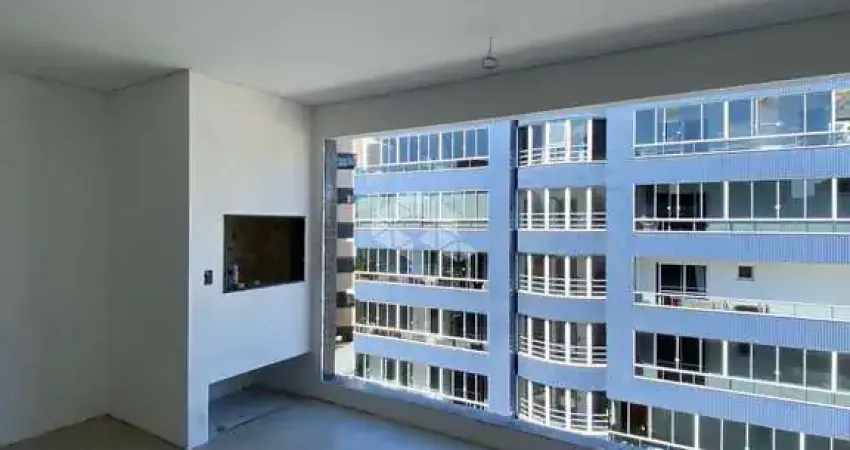 Apartamento novo à venda com 02 dormitórios,  01 suíte e sacada no bairro Nossa Senhora de Lourdes em Santa Maria, financiável.