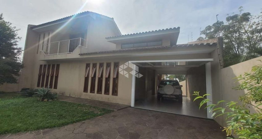 Casa com 4 quartos e 2 suítes com espaço gourmet no Bairro Camobi em Santa Maria