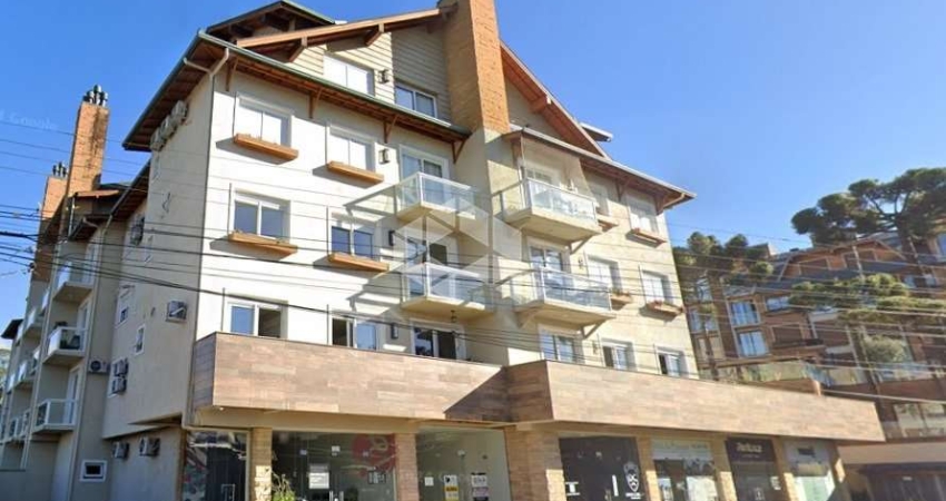 A venda apartamento de 1 dormitório sendo 1 suíte no centro de Canela.