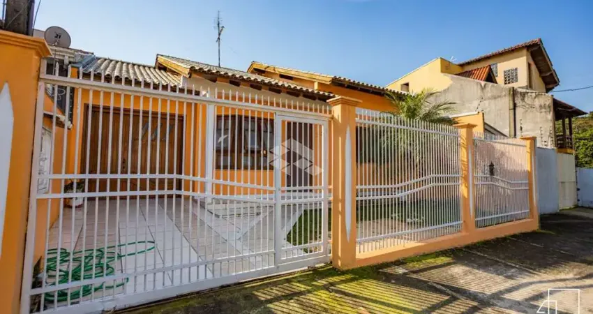 Casa térrea à venda em Canoas, Bairro Moinhos de Vento, com 2 dormitórios, financiamento e espaço para toda a família