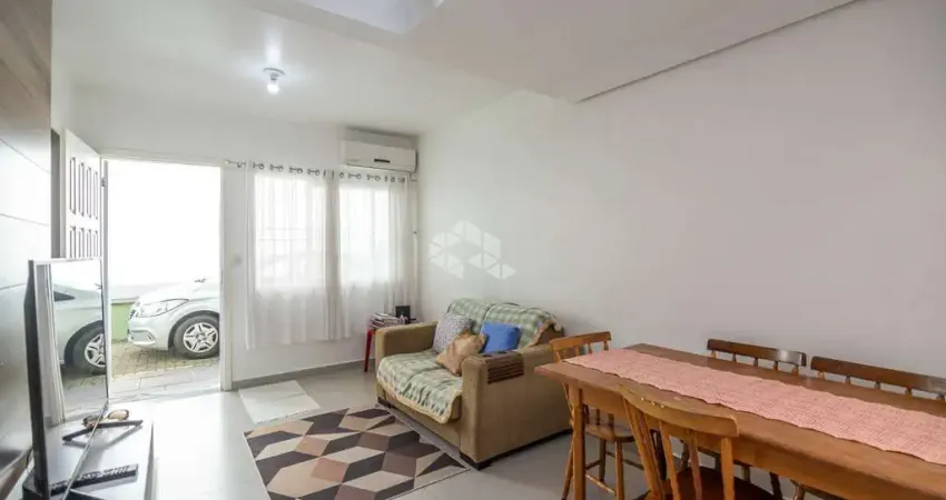 Casa condominio, 58,13 m² de área privadas, 2 dormitórios, living com 3 ambientes, sala de estar, jantar e cozinha, 1 vaga de garagem