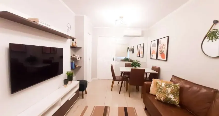 Casa em condominio fechado no bairro Igara com 2 quartos, lavabo, cozinha sob medida, semimobiliada e patio coberto nos fundos com churrasqueira.