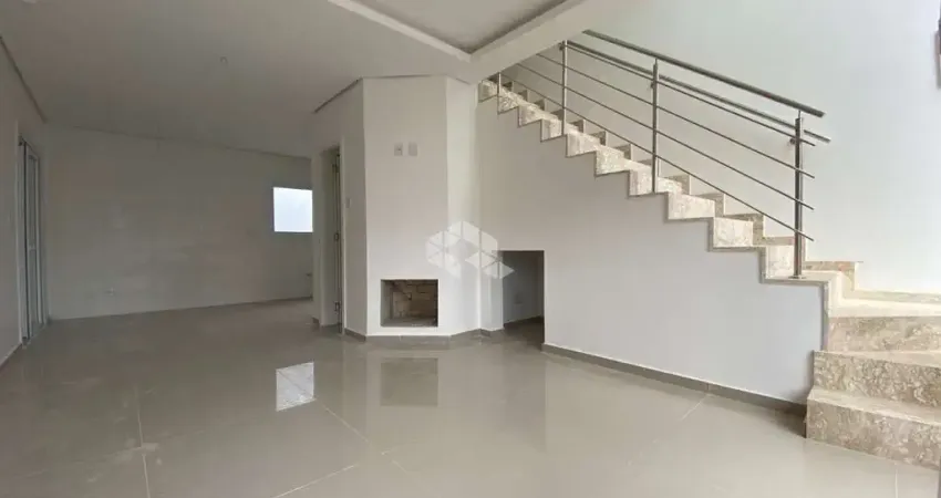 Sobrado NOVO 3 dormitórios, 1 suíte, 2 vagas de garagem, sala estar lareira, churrasqueira, pátio, sacada, água quente, São José/Canoas. Financia
