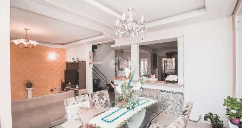 Casa/sobrado com 3 dormitórios, suíte master com hidromassagem, piscina e churrasqueira em Canoas, aceita financiamento e uso do FGTS