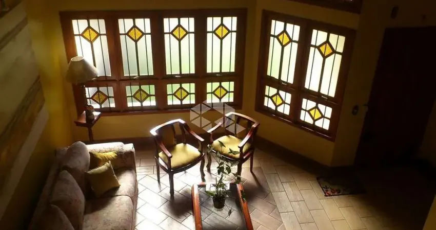 Casa com 4 quartos à venda na Oduvaldo Viana Filho, 311, Marechal Rondon, Canoas